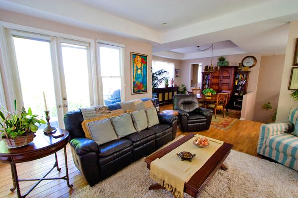 alternate view of  living room & seating for 8