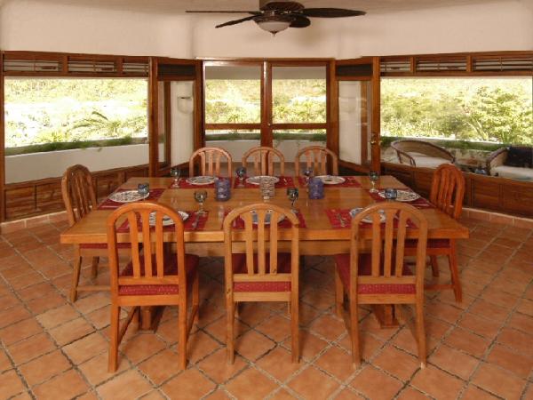 Central room dining area and veranda