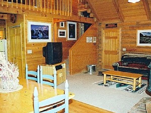 Dining area showing ajoining living room. 