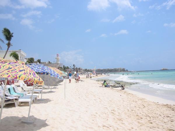 White sandy beach in front of condo