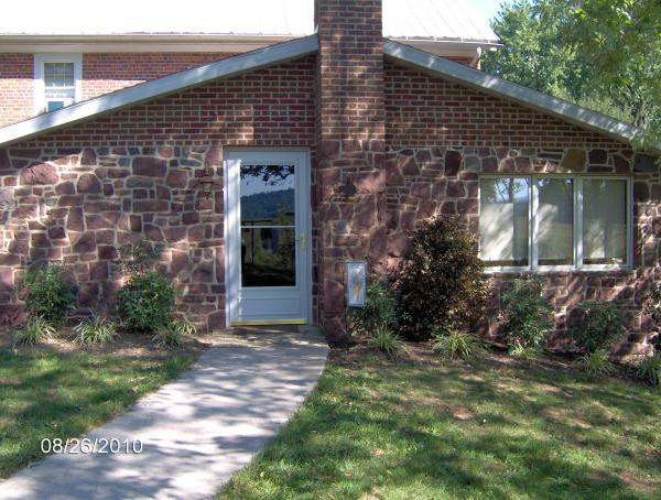 Entrance into Sunroom that overlooks creek