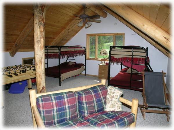 Loft has twin bunkbeds and a set of double bunkbed
