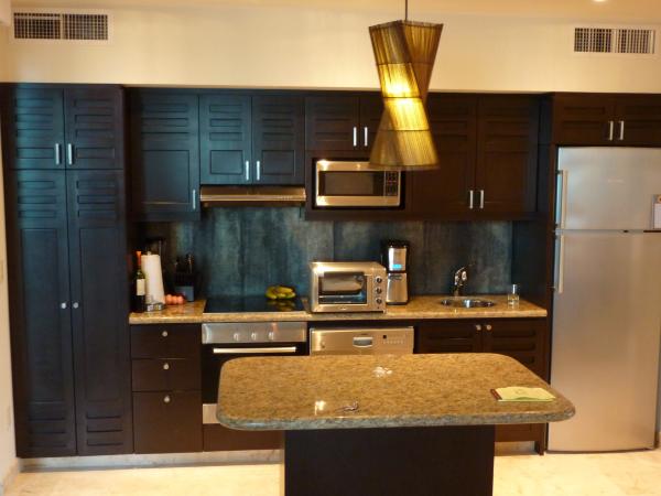 Full Kitchen with dishes, cookware, and terrace