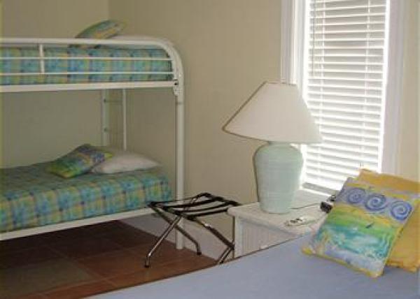 Bedroom 3 has a Queen and Twin Bunks