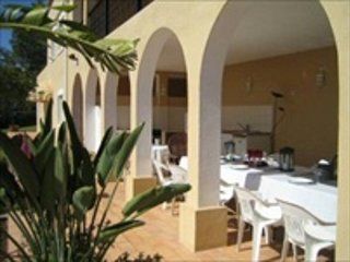 Covered terrace with long table