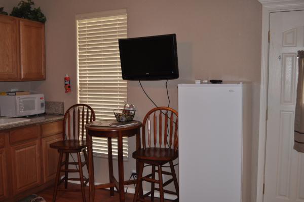 Dining Area with  Flat Screen T.V.