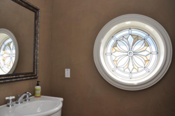 Half Bath:pedestal sink, custom stained glass wind