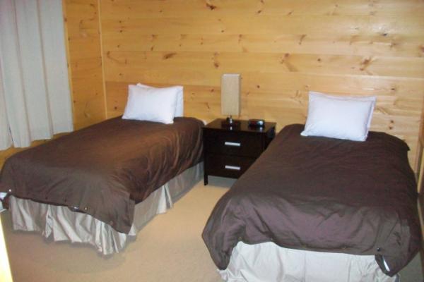 Fourth bedroom on bottom level with two single bed