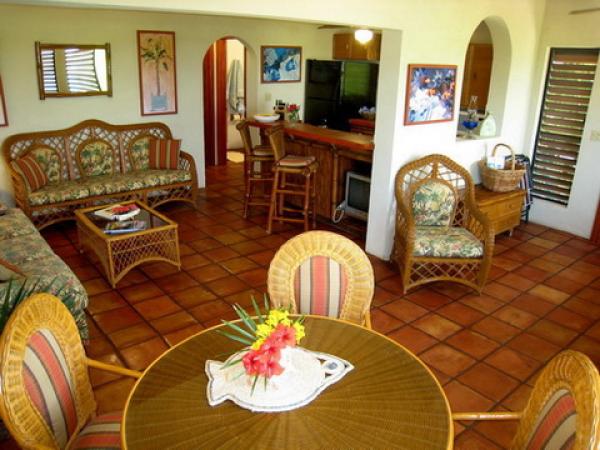 Dining area with seating for four people.