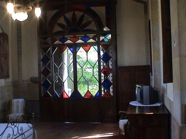 Glass door with its original coloured panes