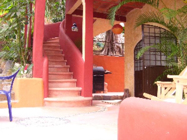 Patio, Lower Unit and stairs to Upper Unit