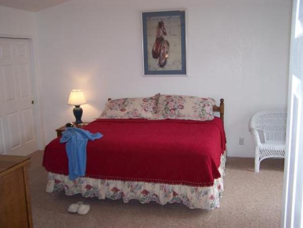 King bedroom with lots of room to relax 