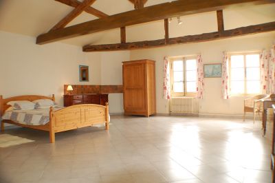 one of the spacious bedrooms in the chateau