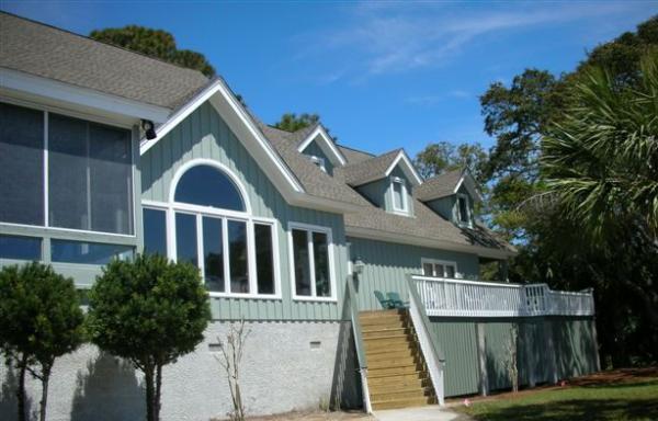 Great screened area on left & wrap porch on right.