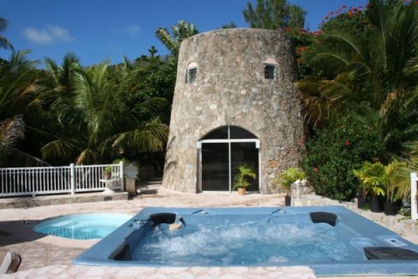 View of Sugar Mill, pool and hot tub