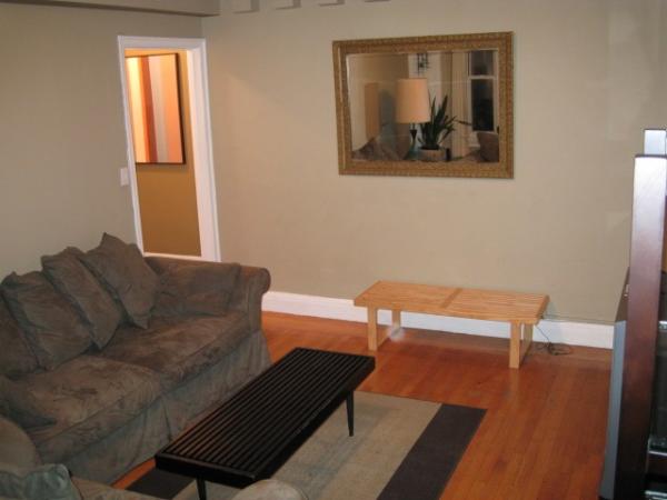 Living Room with Sofa and Mirror