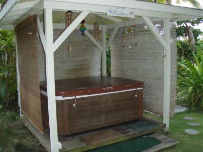 Hot tub in gazebo in yard