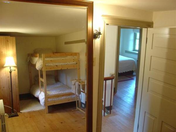 Reflection of Bunk Bedroom in Floor Length Mirror