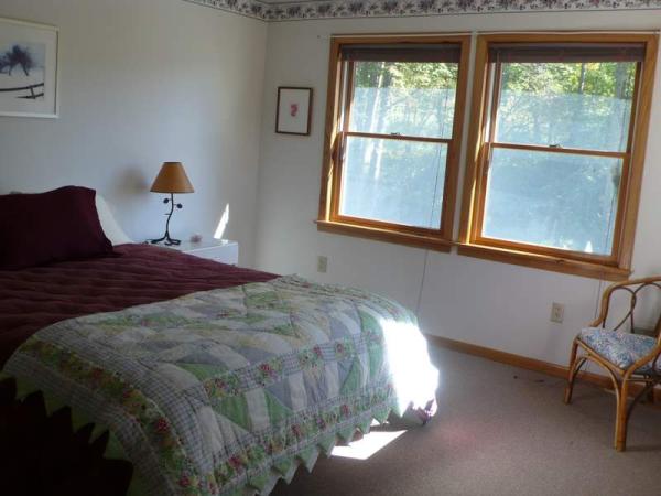 bedroom 4 - queen bed, view of field and woods
