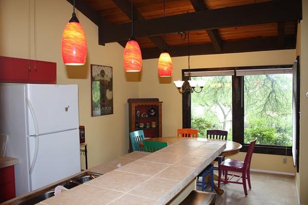 Laundry closet in hallway with full sized machines
