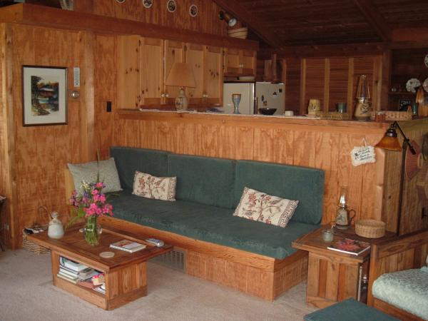 Upstairs couch looking toward kitchen