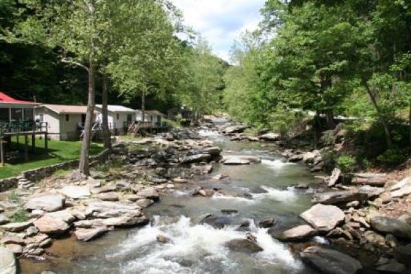 Looking upriver from our bridge, cabins on left