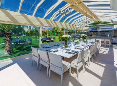 Conservatory with kitchen and dining area