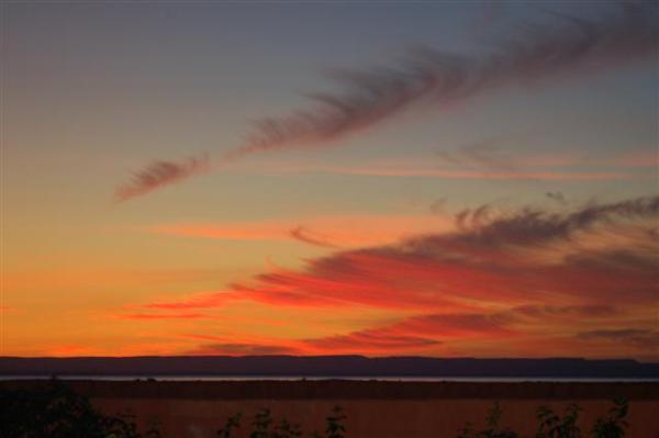This sunset is from the condo living room balcony!