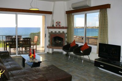 Air conditioned sitting room with fireplace