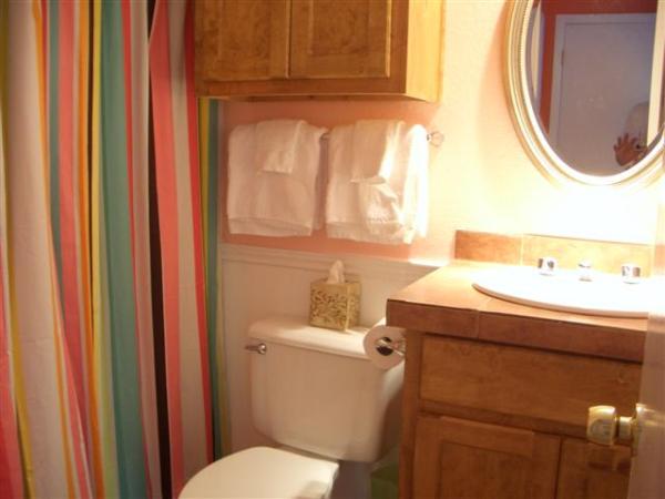 Love seat and glass table in Bedroom