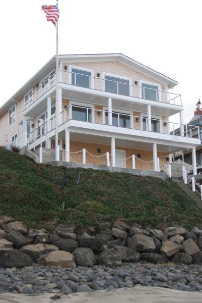 Beach view of home w/ private stairs to beach