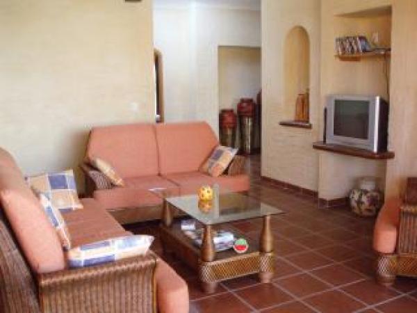 entertainment center and to bedrooms