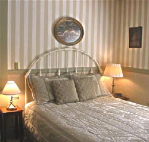 Rose Suite's Queen Bed