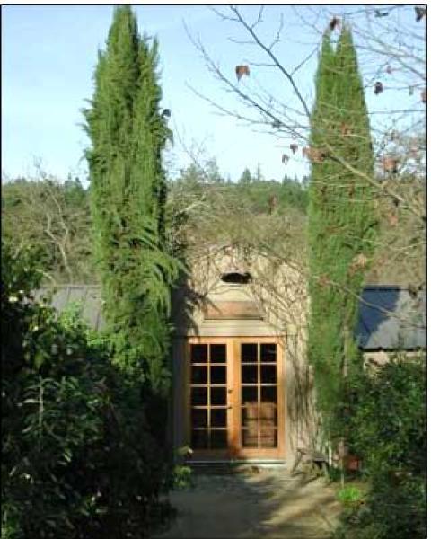 Flanked by Italian Cypress Trees