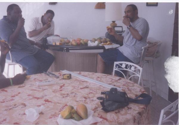 Guests feasting on Mangoes grown on property