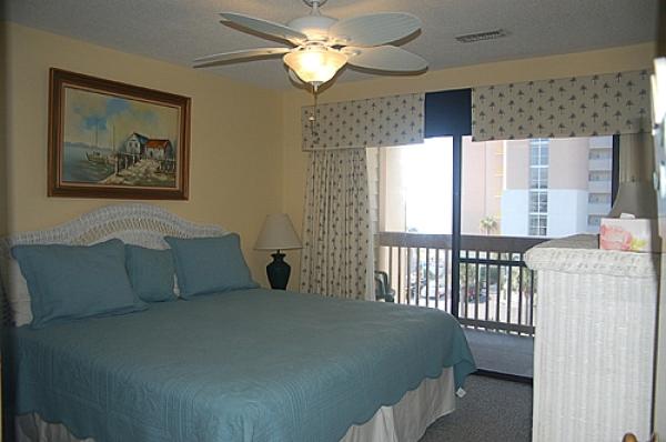 Master bedroom with open balcony and ocean view