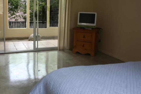 Bedroom 1 off courtyard view