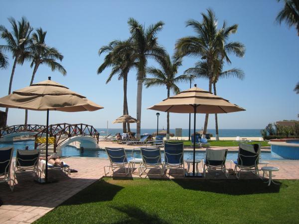 Relaxing poolside lounges and umbrellas 