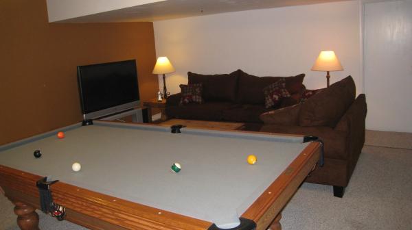 Pool Table/ TV Queen Sleeper