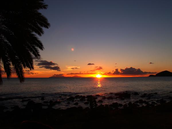 Sunset on the deck as the sun sets over Montserrat