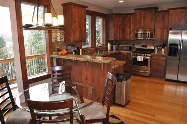 View Of Dining Table & Kitchen