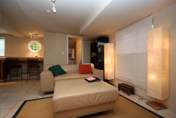 Living Room-leather couch and ottoman, fireplace