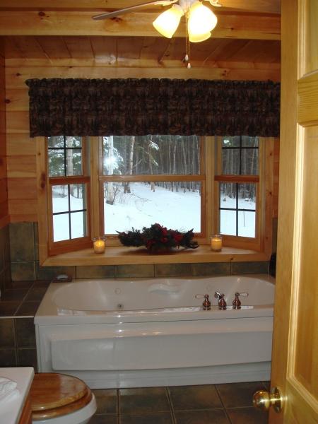 Bathroom w/ Tile and Whirlpool Tub