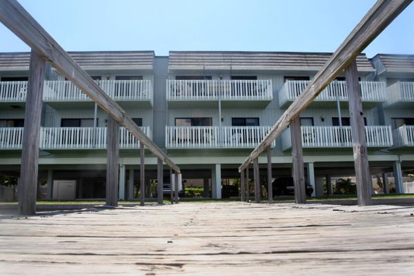 THE BUILDING AS SEEN FROM THE DOCK ON THE BAY.