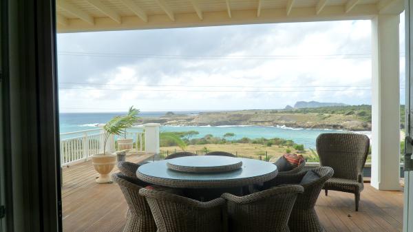 Terrace with view of bay and beach