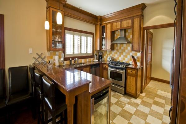 Kitchen with gas stove and wine fridge