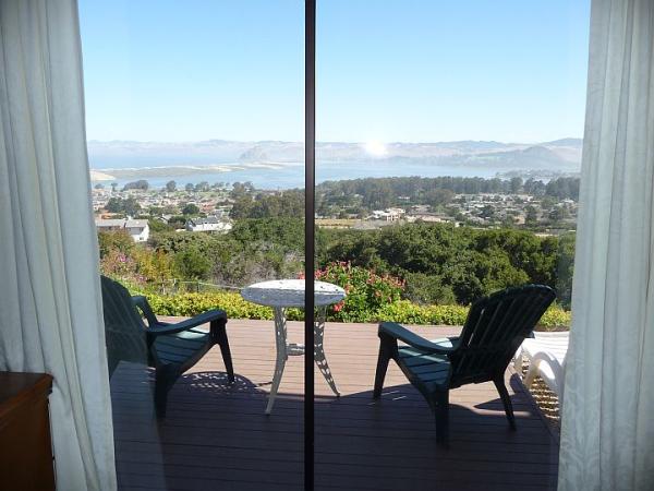 Enjoy morning coffee relaxing on master suite deck