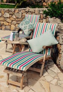 A relaxing time for two in a quiet area beside the pool