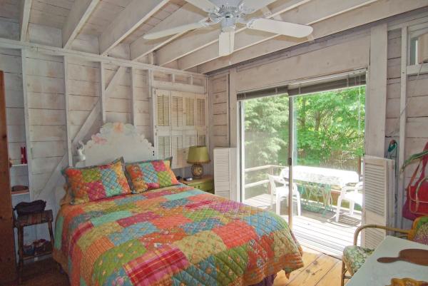 Downstairs bedroom - queen bed and deck