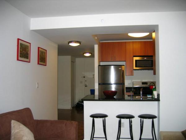 fully equipped kitchen with granite countertops